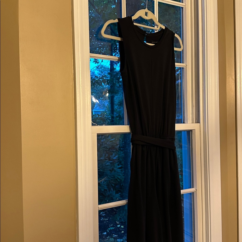 Banana Republic Classic Black Jumpsuit
Side pocket key hole back closure
